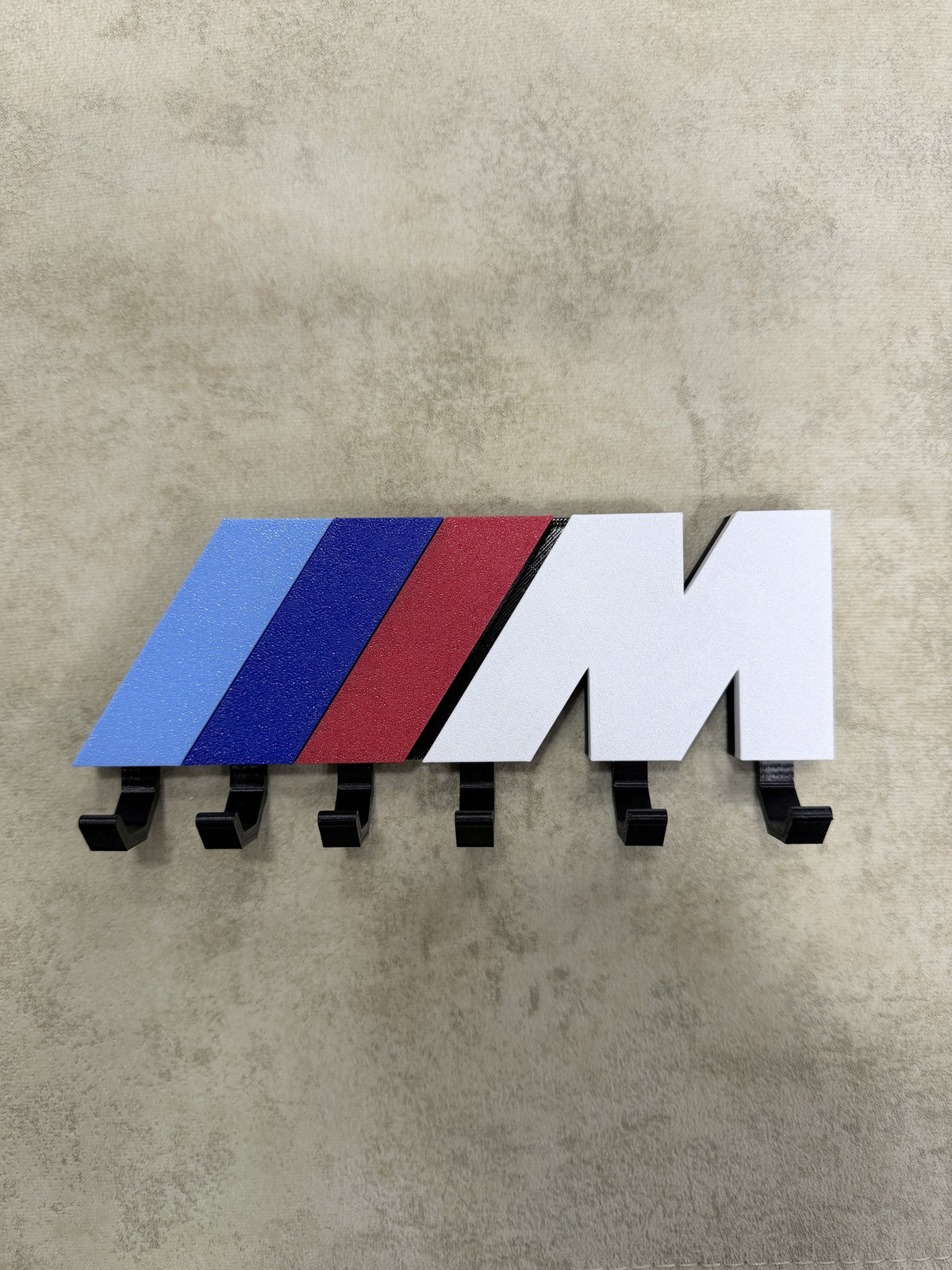 BMW M Stripe key holder rack front view with BMWMPART Accessories logo