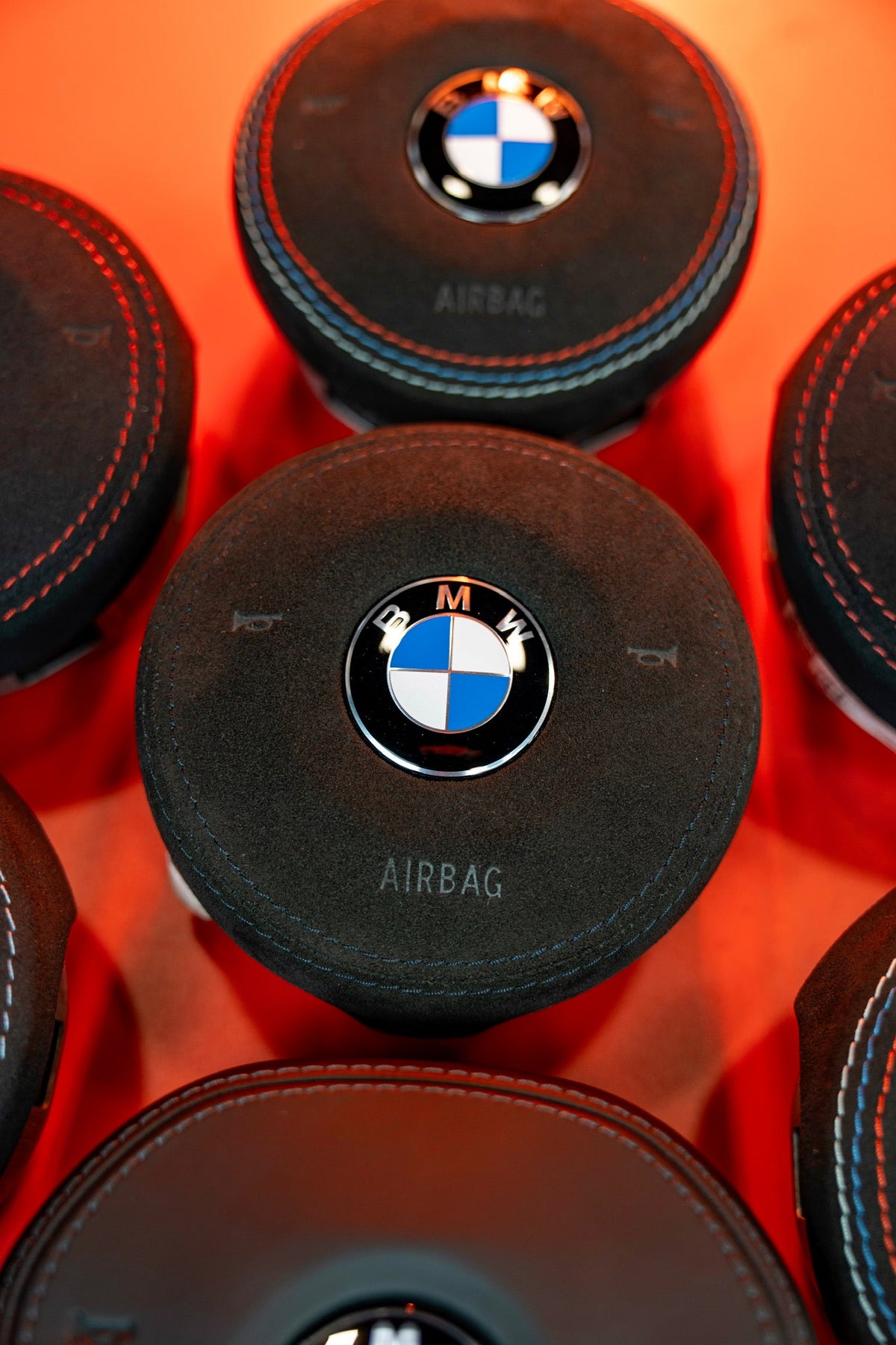 BMW F-Series Alcantara OEM Airbag Black Stitching - close up