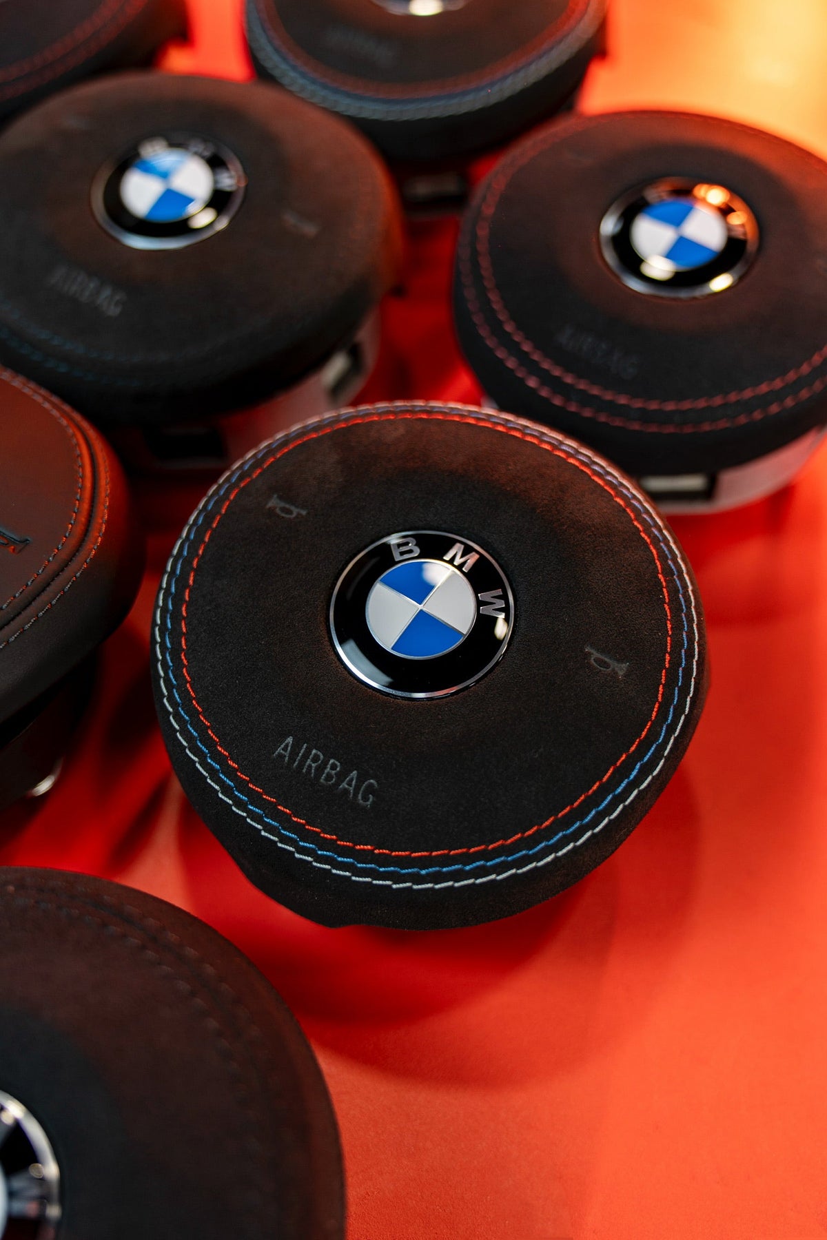 BMW F-Series Alcantara OEM Airbag M-Color Stitching - stock display