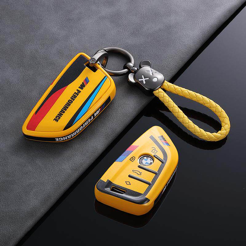 BMW Style B G-Series key fob case, yellow shell, woven rope strap keychain