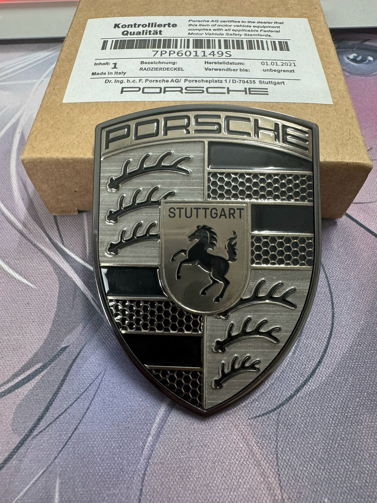 Porsche smoked gray crest hood badge with presentation box