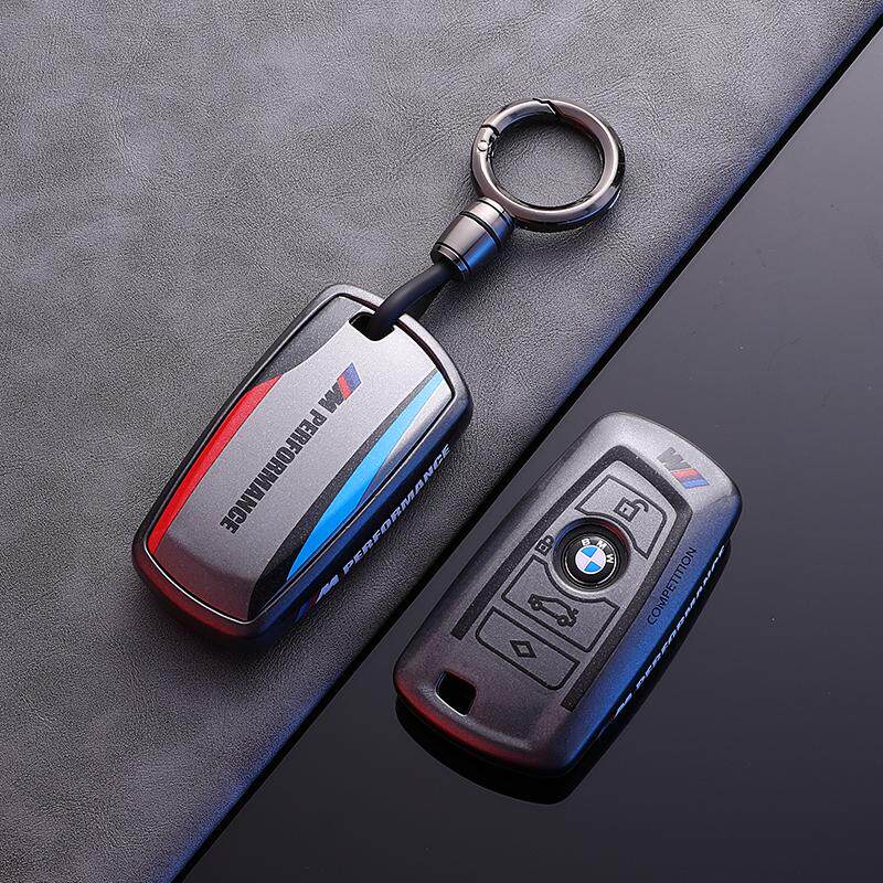 BMW Style A F-Series key fob case, black shell, sporty round buckle keychain