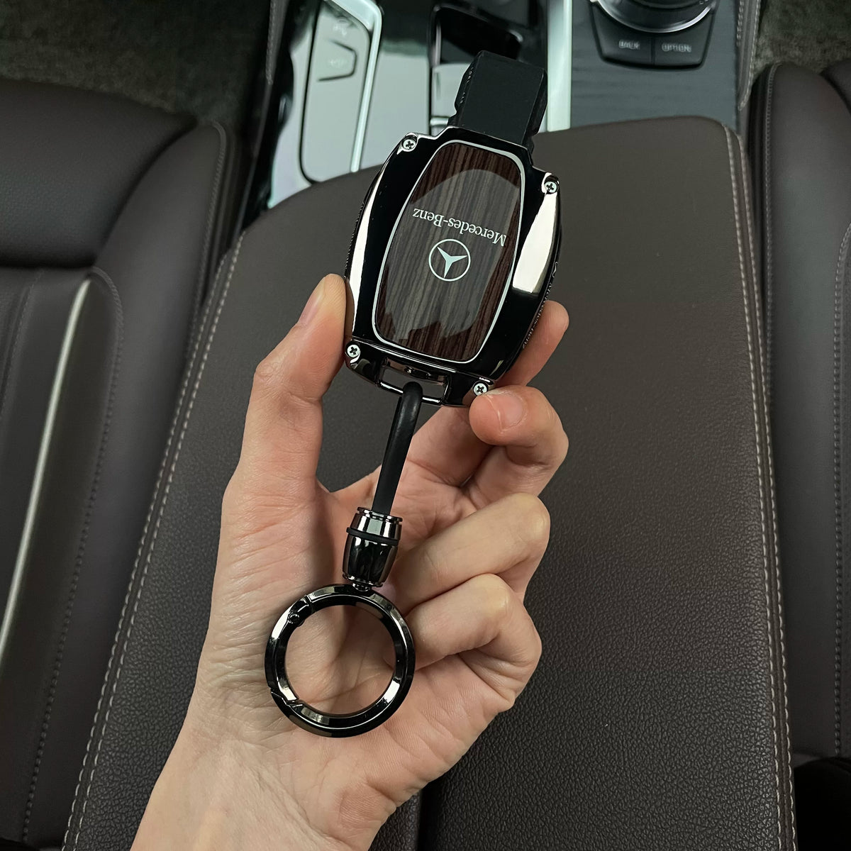 Brown wood grain Mercedes-Benz key case with ring keychain