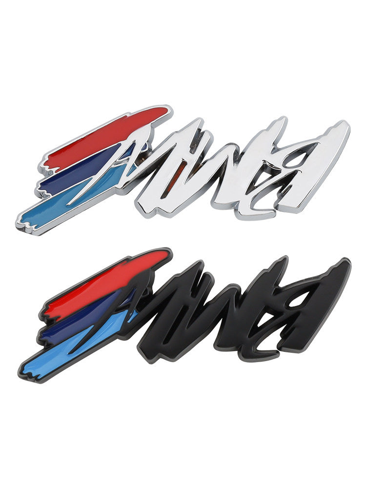 BMW tricolor metal badge close-up, silver and black versions