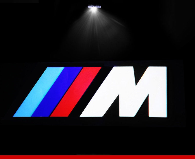 BMW roundel door welcome light projector close-up