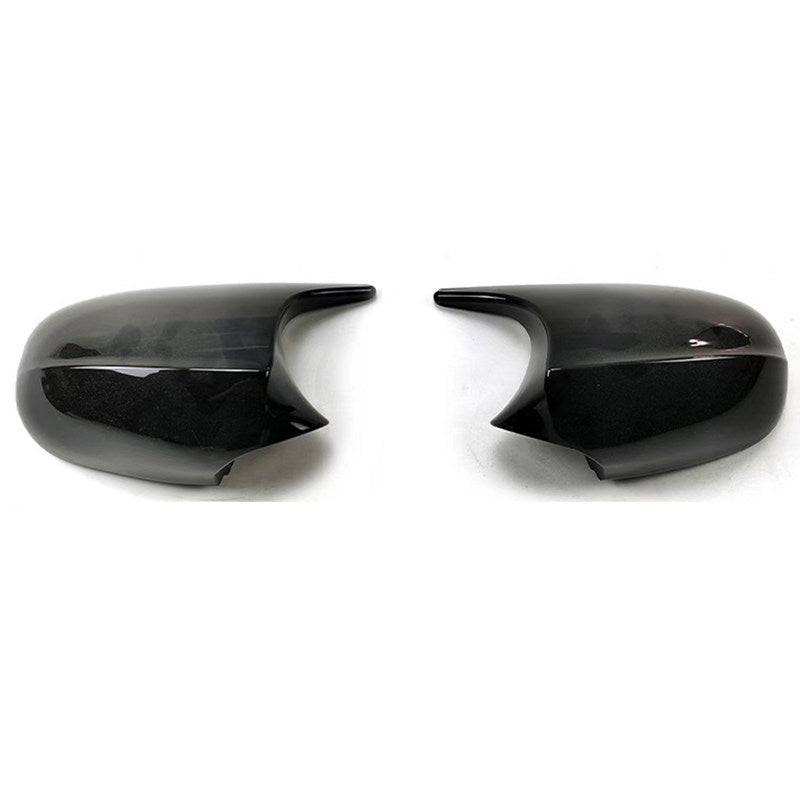 BMW carbon fiber horn mirror cover pair on white background