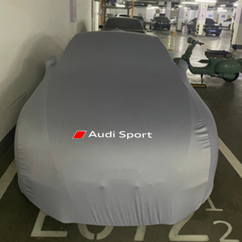 Audi Sport stretch car cover in grey fitted over a sedan