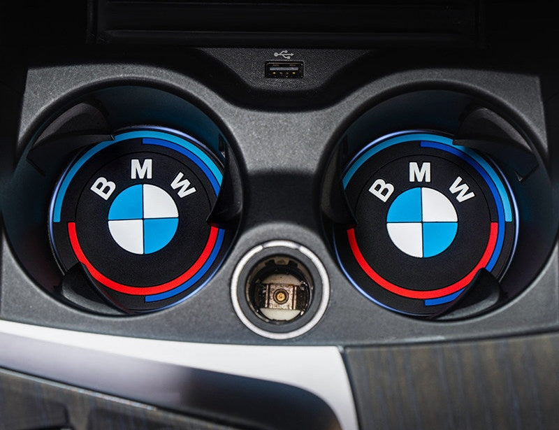 BMW cup holder coasters installed in center console, top view