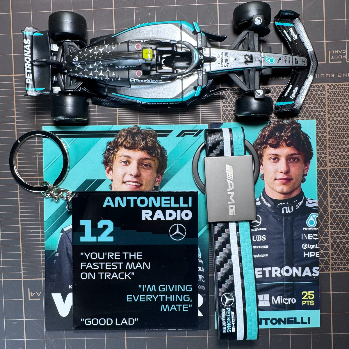 Full collector set: F1 car keychain, Antonelli radio pendant and AMG strap