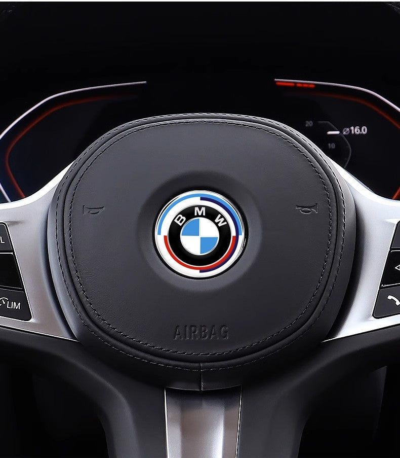 BMW Anniversary Edition steering wheel badge installed