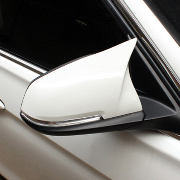 BMW carbon fiber horn mirror cover installed on vehicle