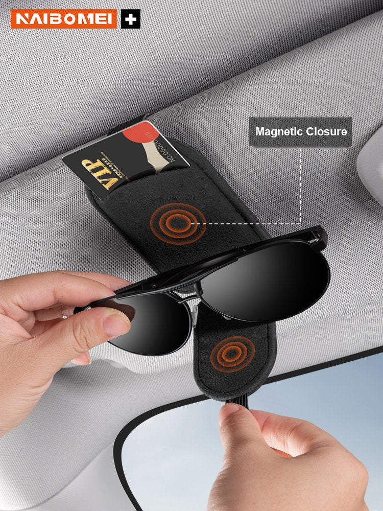 Magnetic closure BMW suede glasses clip holding sunglasses on visor