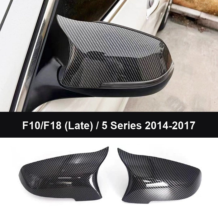 BMW glossy black horn mirror cover installed on vehicle