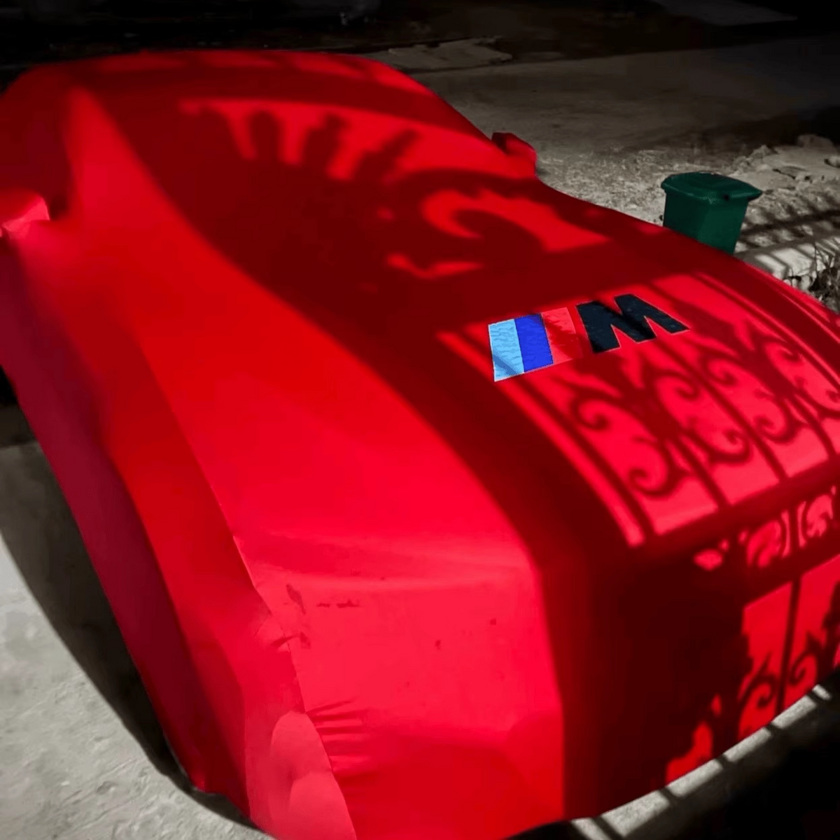BMW M logo car cover in red, tailored stretch fit