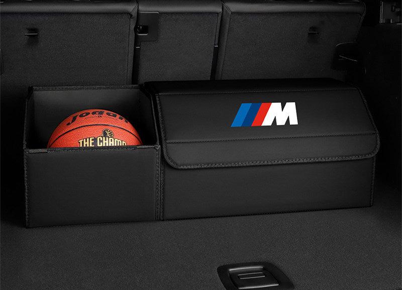 Black leather BMW M trunk storage box - medium size with extended open basket holding a basketball