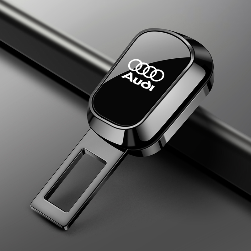Audi seat belt extender single piece in gloss black alloy with Audi rings