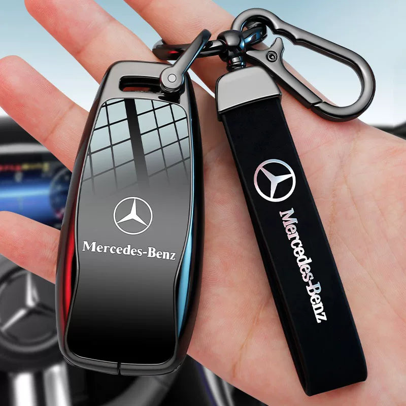 Mercedes-Benz key case with strap keychain in hand