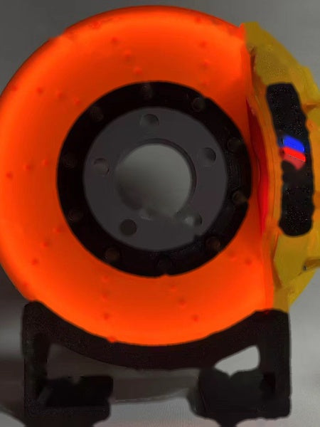 BMW M brake disc LED night light, yellow caliper, glowing orange LED