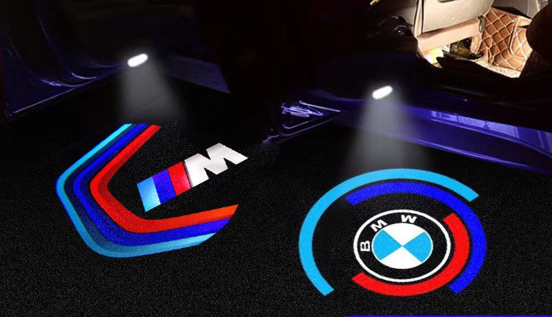 BMW roundel welcome light close-up on door sill