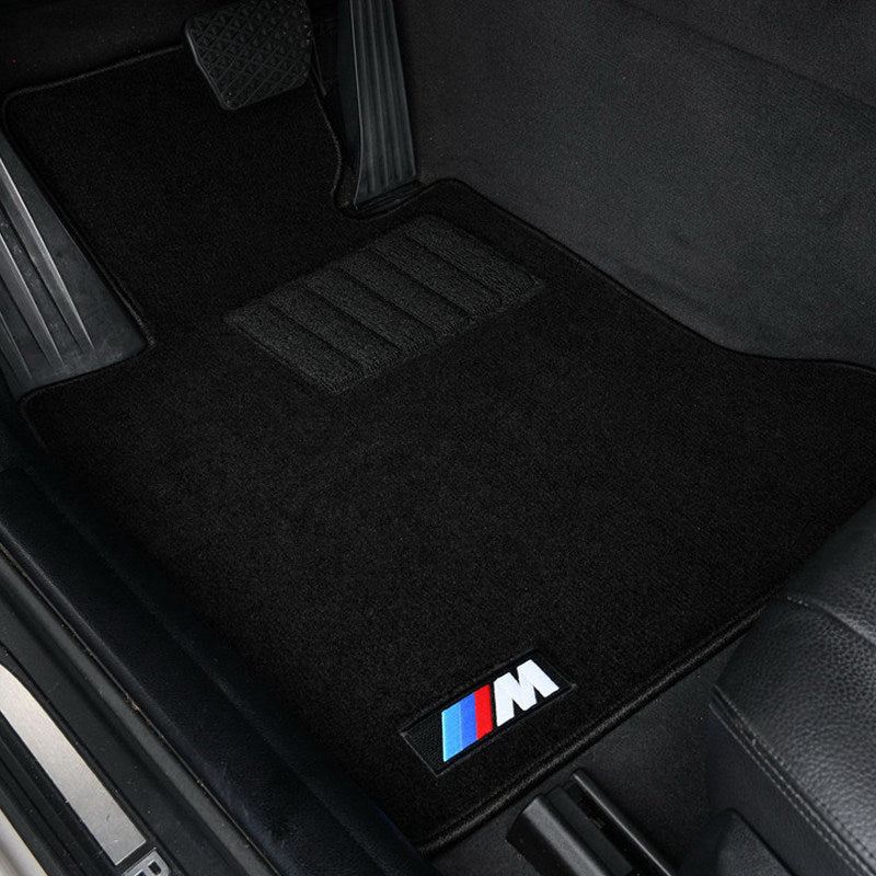 BMW black velvet driver's floor mat with M performance badge