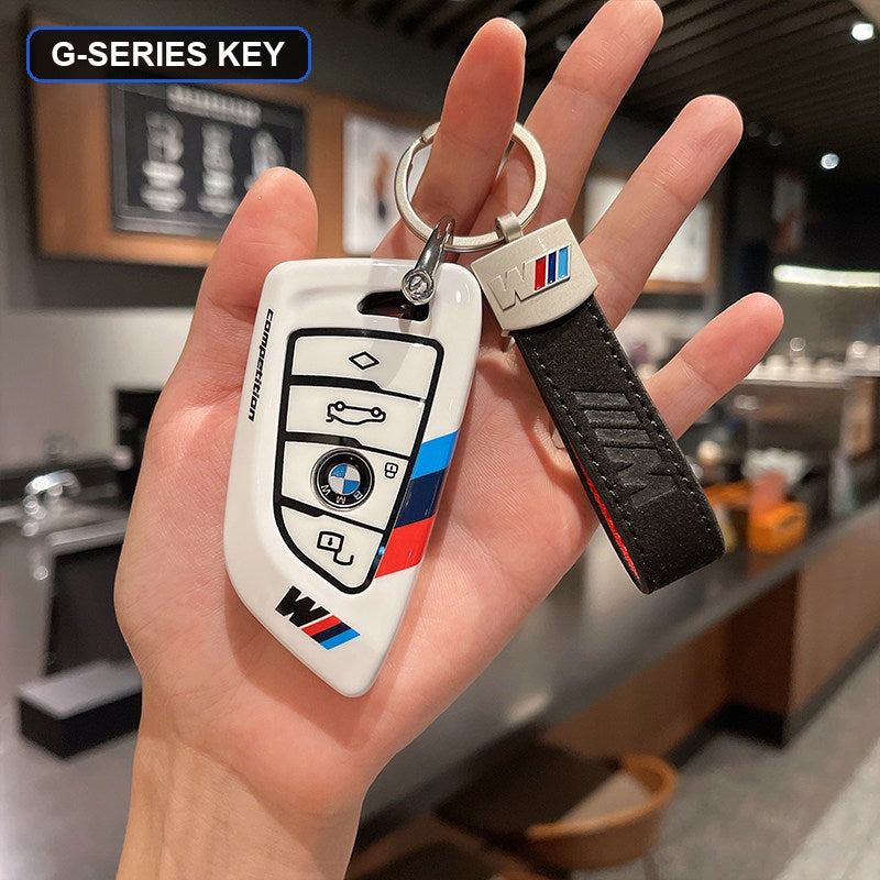 BMW key shell case white with black leather strap keychain
