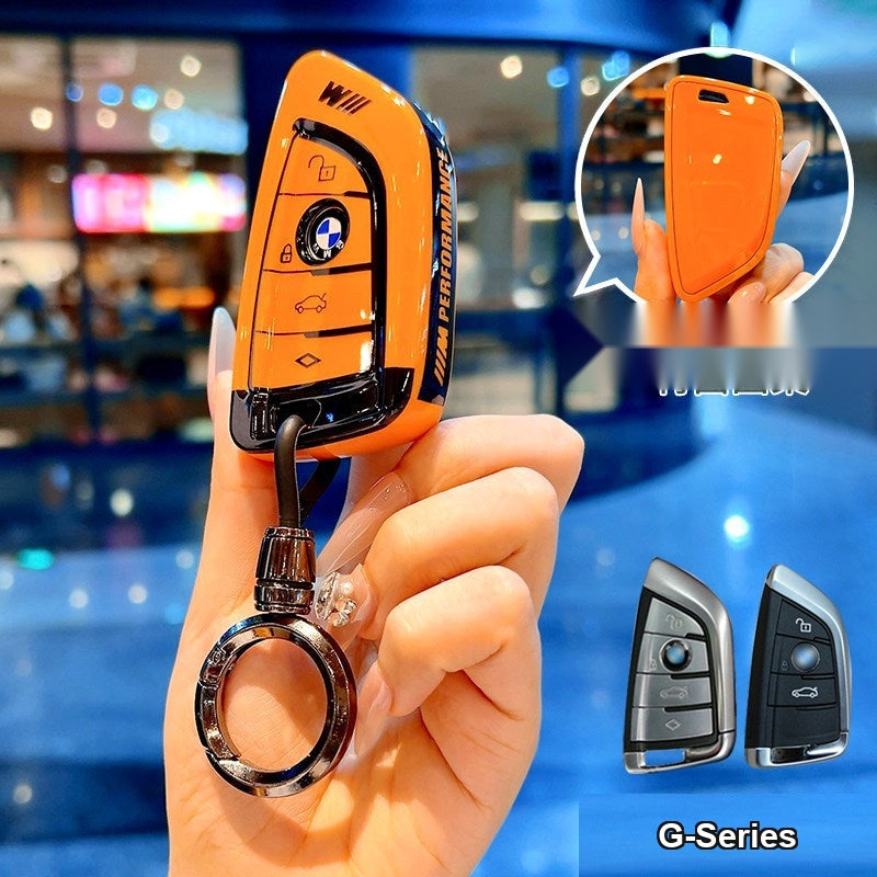 BMW smart key fob orange TPU case with bullet round buckle keychain