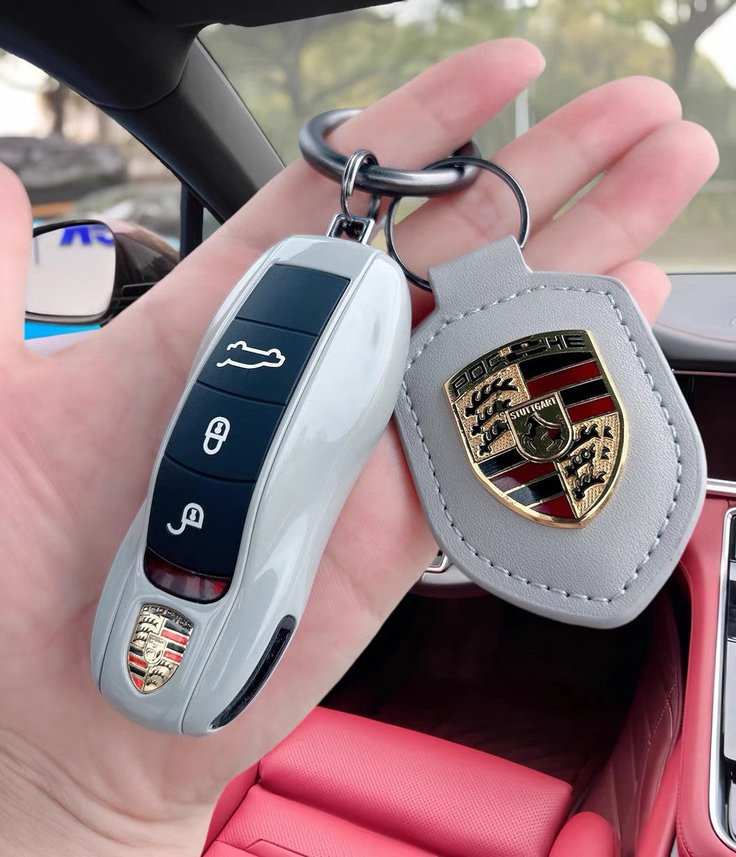 Porsche Key Case Set – Glossy Shell with Wrist Strap and Crest Keychain for Macan, Cayenne, Panamera, 911, Taycan and 718