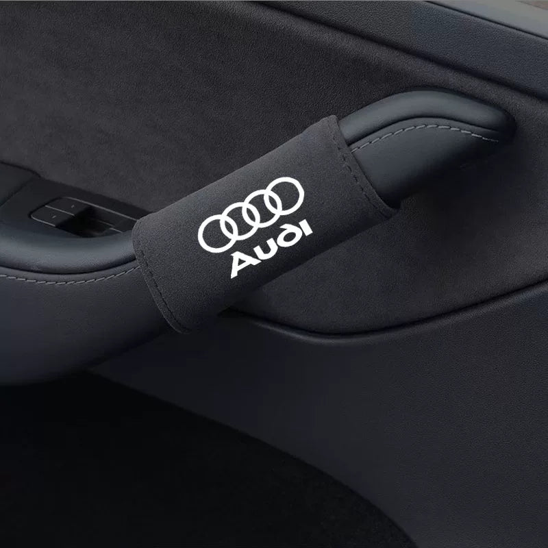 Audi suede door handle cover in black with Audi rings logo
