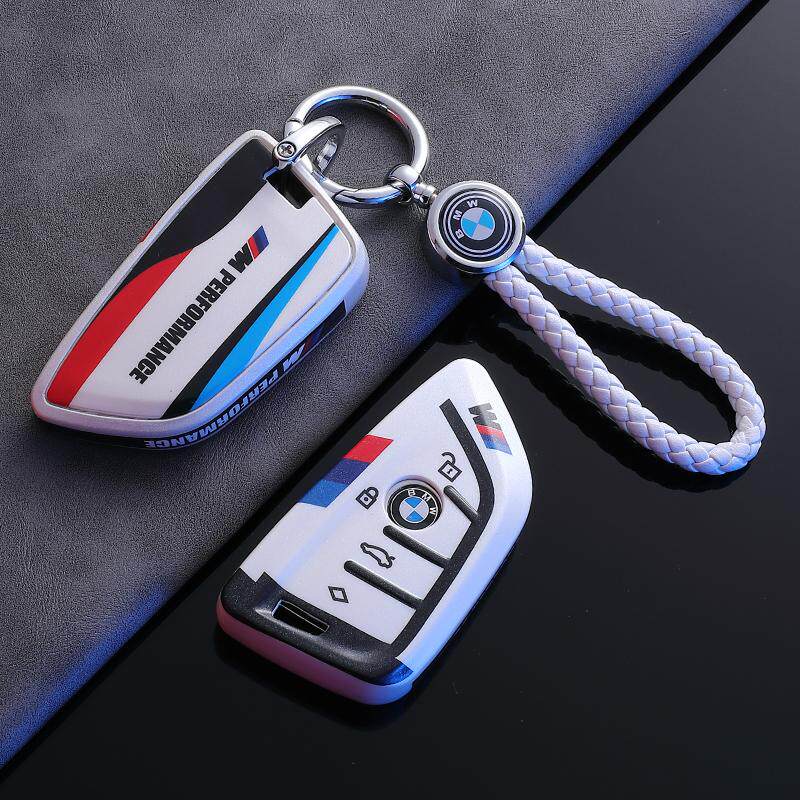BMW Style B G-Series key fob case, white shell, braided logo cord keychain