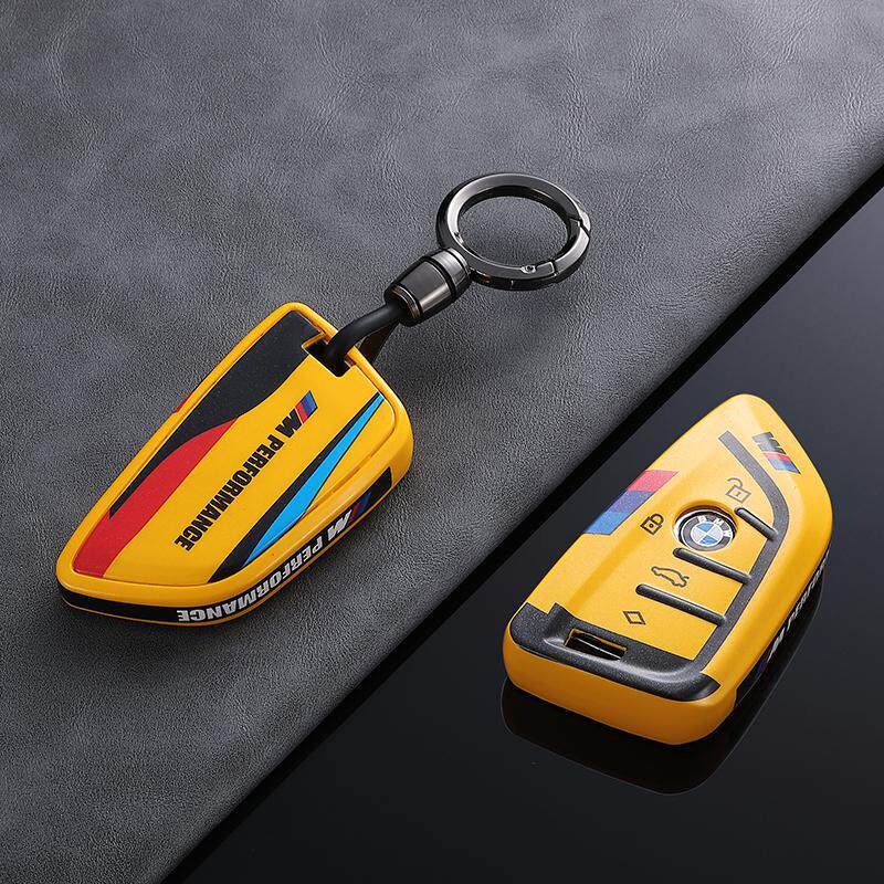 BMW Style B G-Series key fob case, yellow shell, sporty round buckle keychain