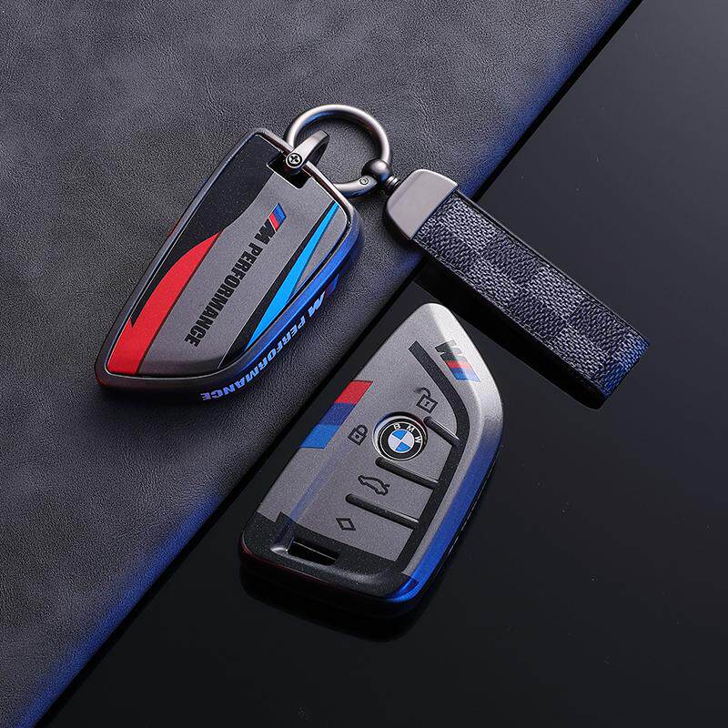 BMW Style B G-Series key fob case, black shell, plaid cord strap keychain