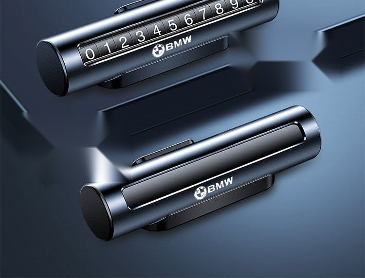 BMW Cylindrical Black rolling-wheel parking number plate, display and closed states