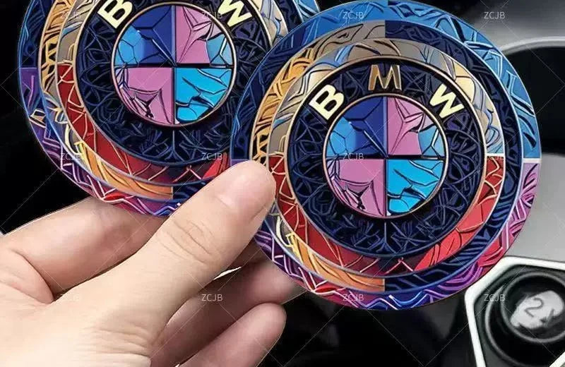 BMW car coasters pair, holographic rainbow finish, close-up in cup holder