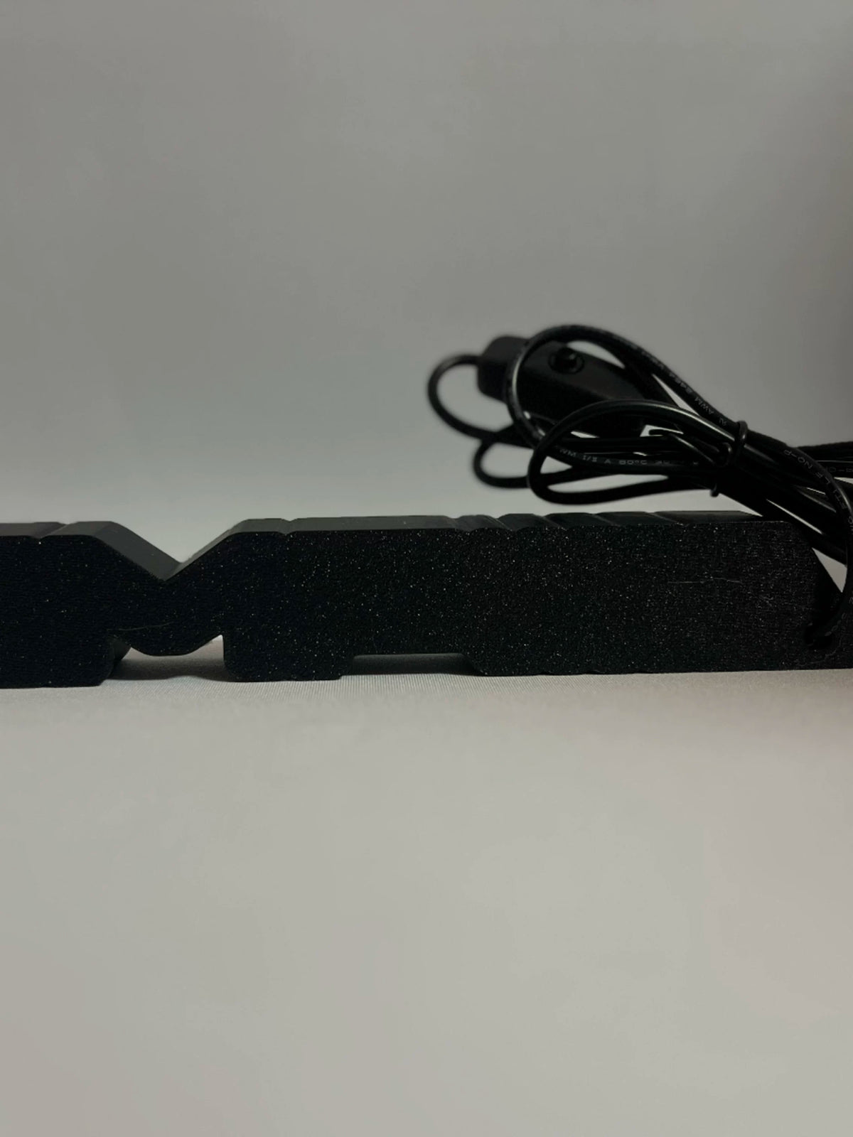 Mercedes-AMG emblem lamp rear view with USB cable