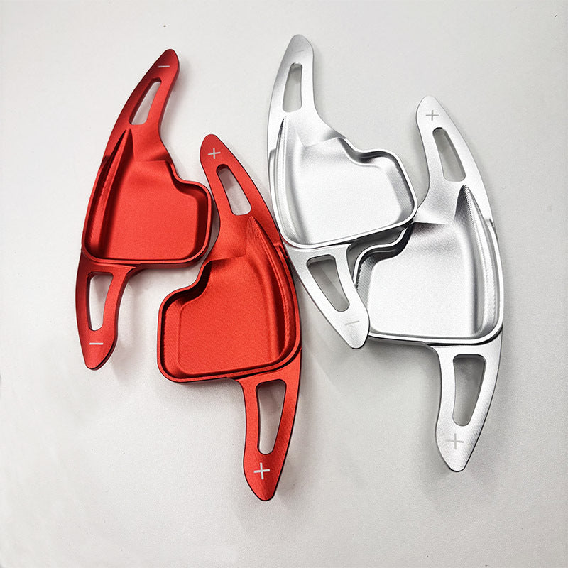 BMW aluminum paddle shifter extensions in red and silver comparison