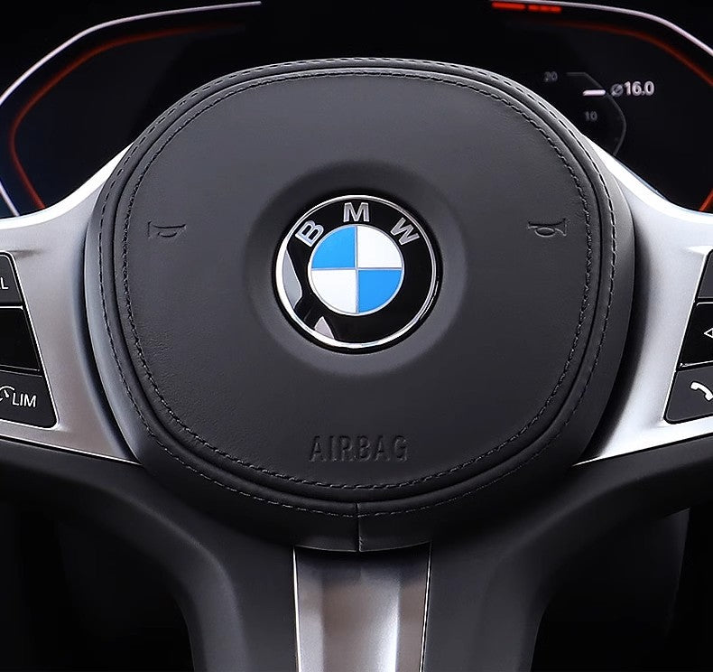 BMW Blue and White steering wheel badge close-up