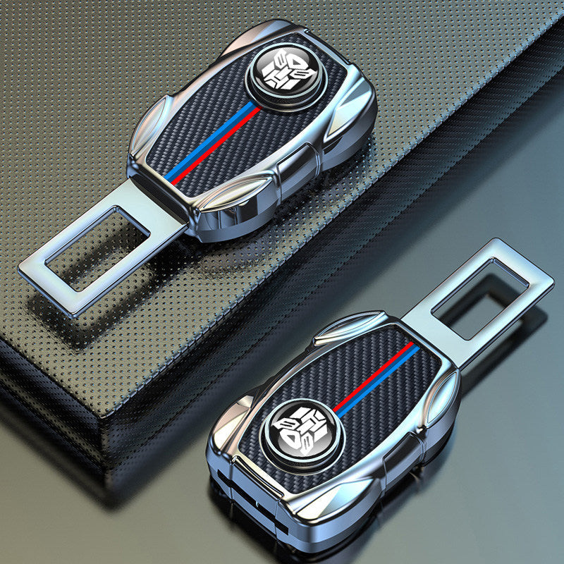 Close-up of BMW carbon fiber M-stripe seat belt buckle extender