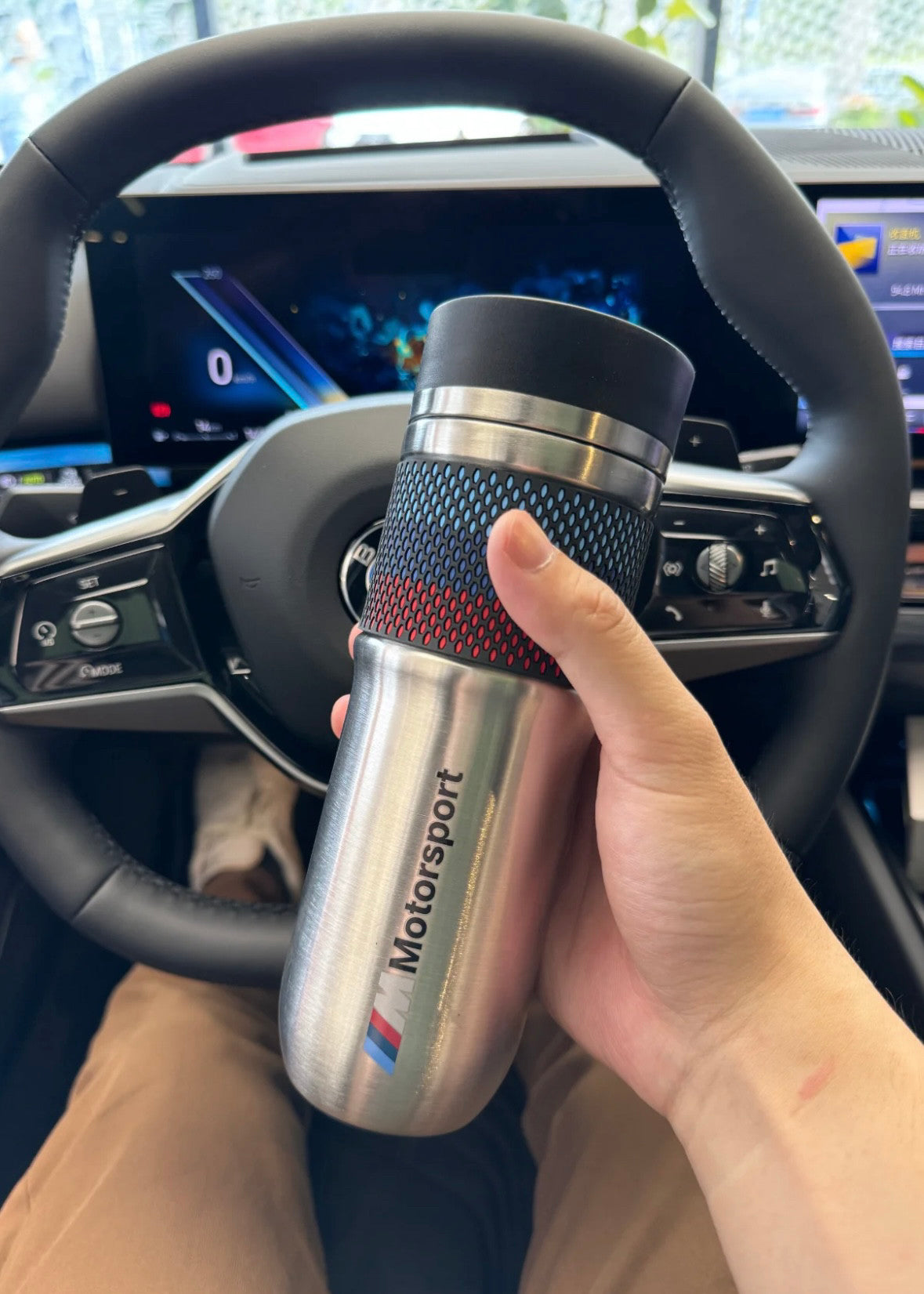 BMW Motorsport insulated cup with M stripe design in BMW interior