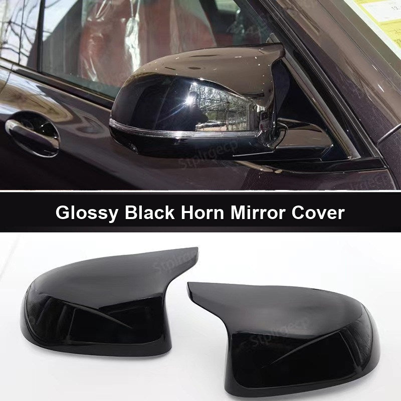 BMW glossy black horn mirror cover installed on vehicle
