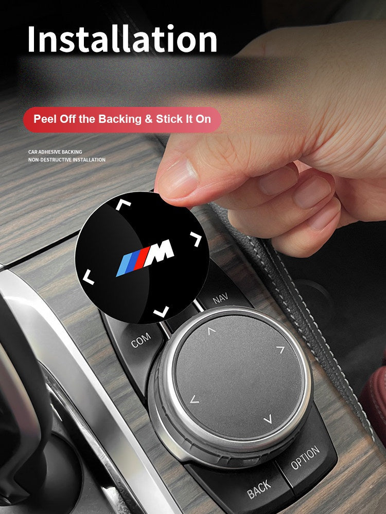 Peel and stick installation of BMW multimedia knob M sticker