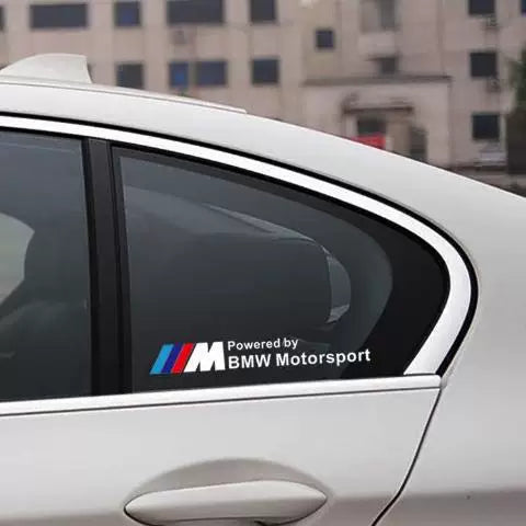 BMW M Motorsport window triangle sticker on white BMW 3 Series rear window