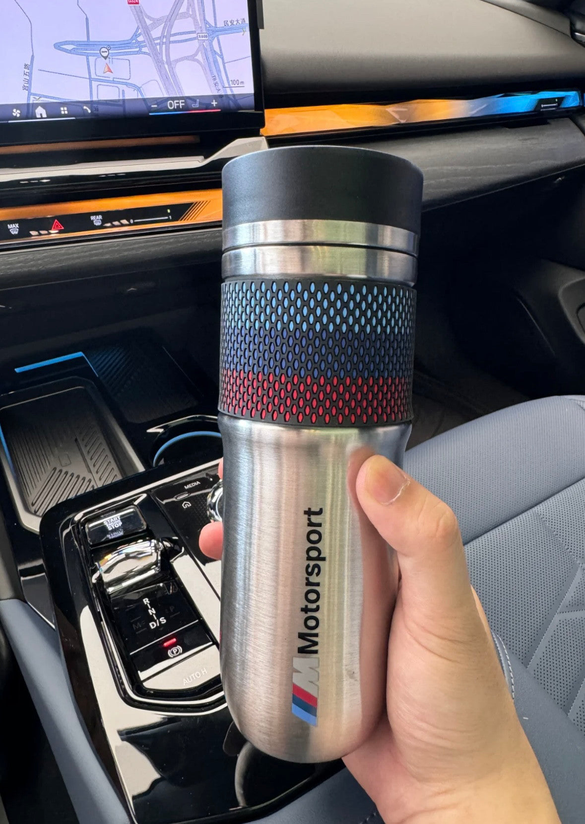BMW M motorsport stainless steel tumbler held in hand