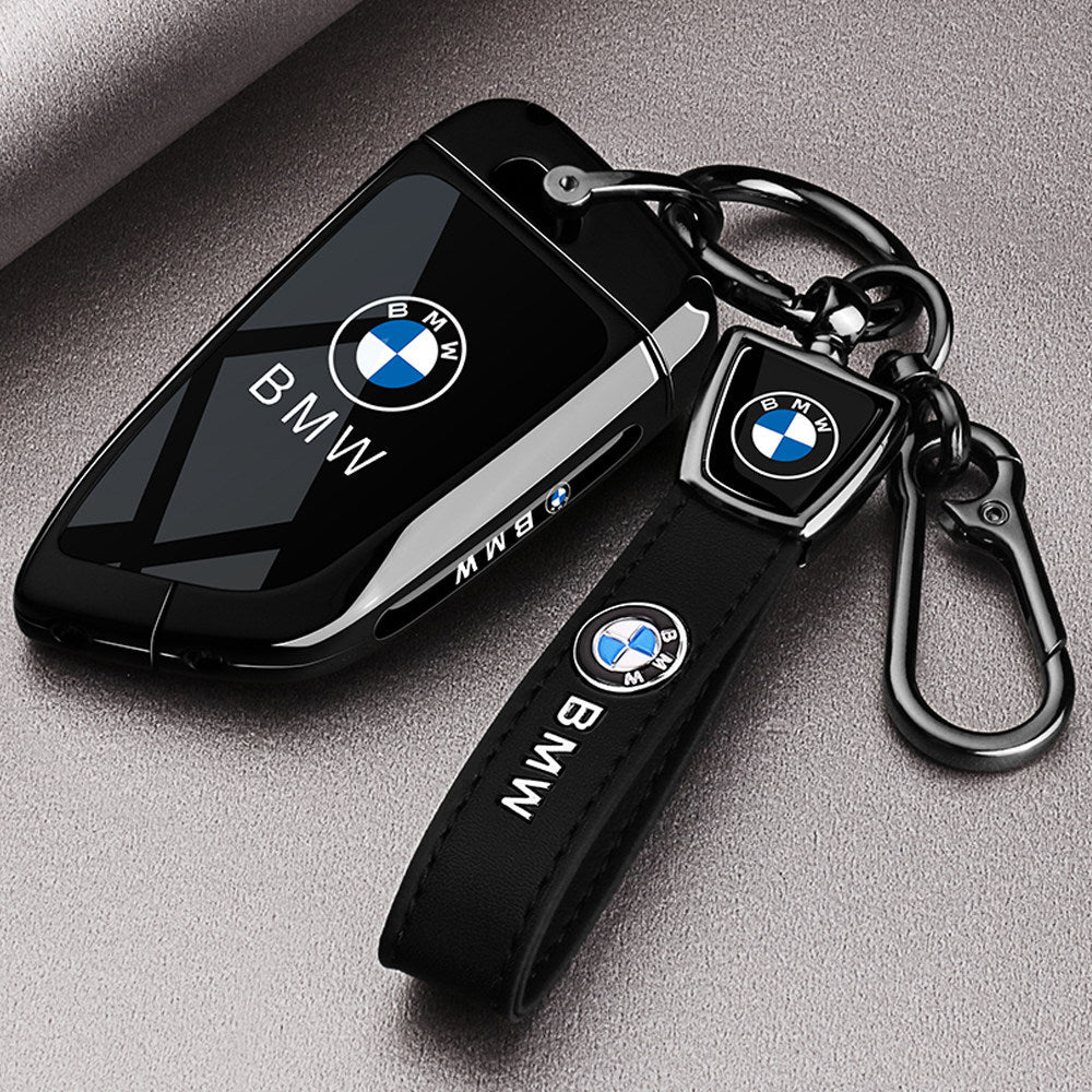 BMW key fob case with leather keychain strap and metal BMW badge