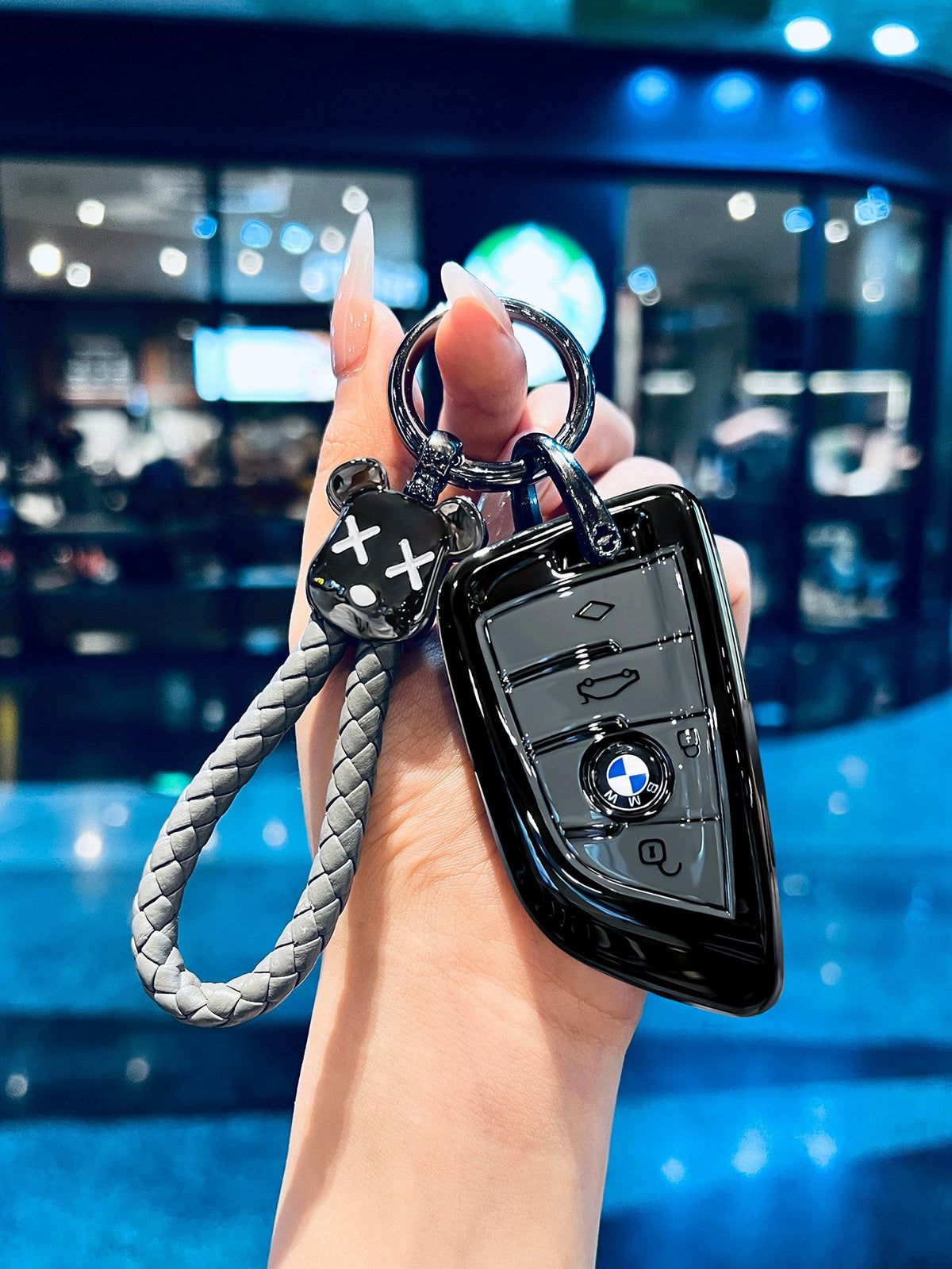 BMW glossy black TPU key sleeve with bear keychain, alternate angle