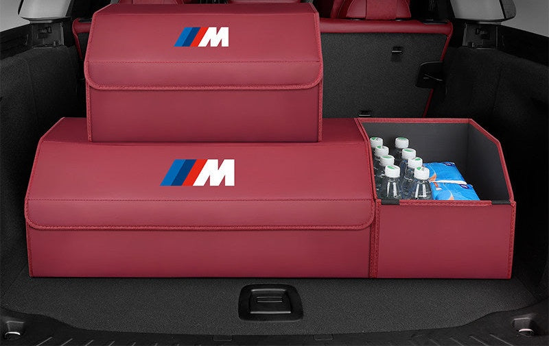 BMW trunk storage box in burgundy with water bottles stored inside