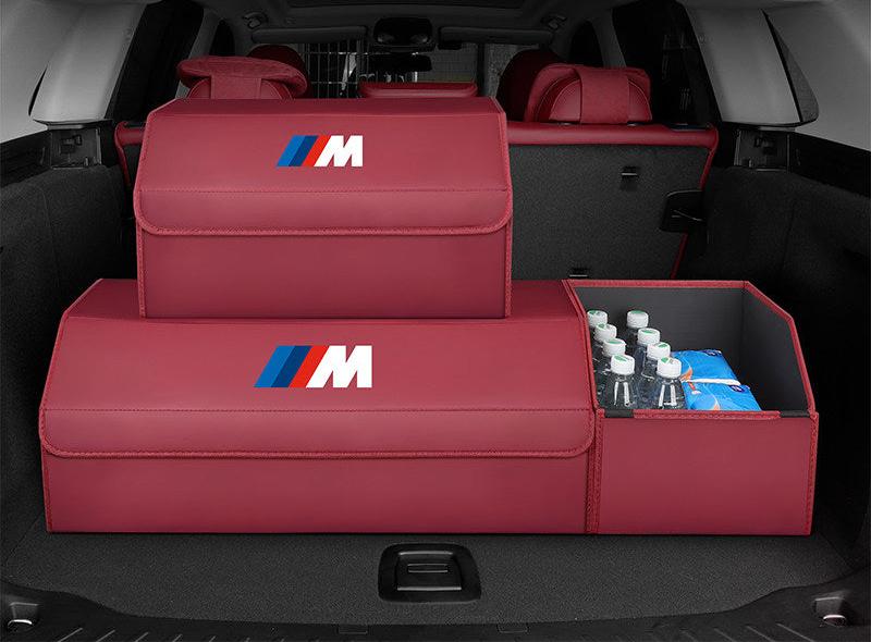 Burgundy BMW M trunk storage boxes with extended open basket holding water bottles
