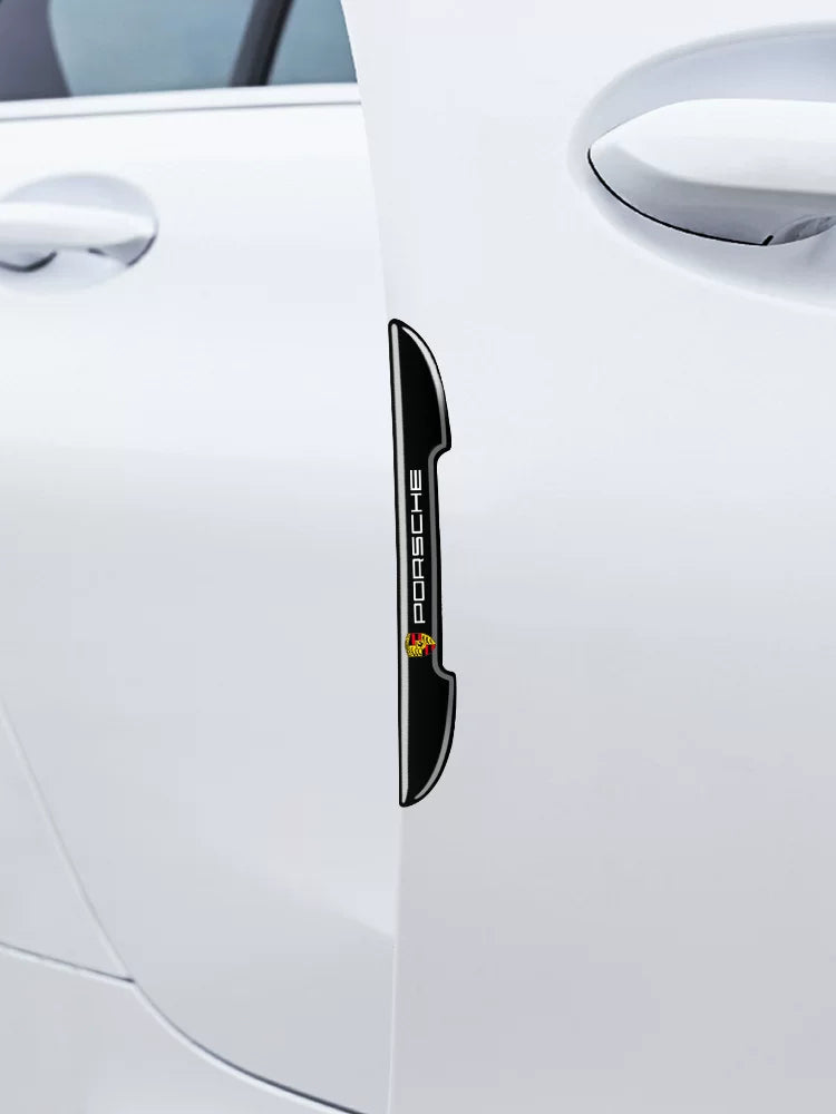 Porsche crest door edge guard fitted on a white car door