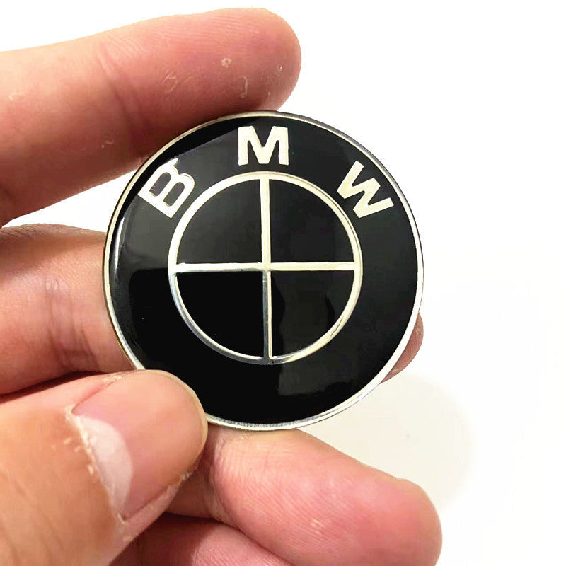 BMW All-Black steering wheel badge close-up