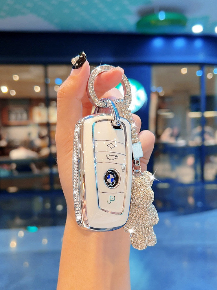 BMW diamond-studded cream white TPU key case with plush bear charm