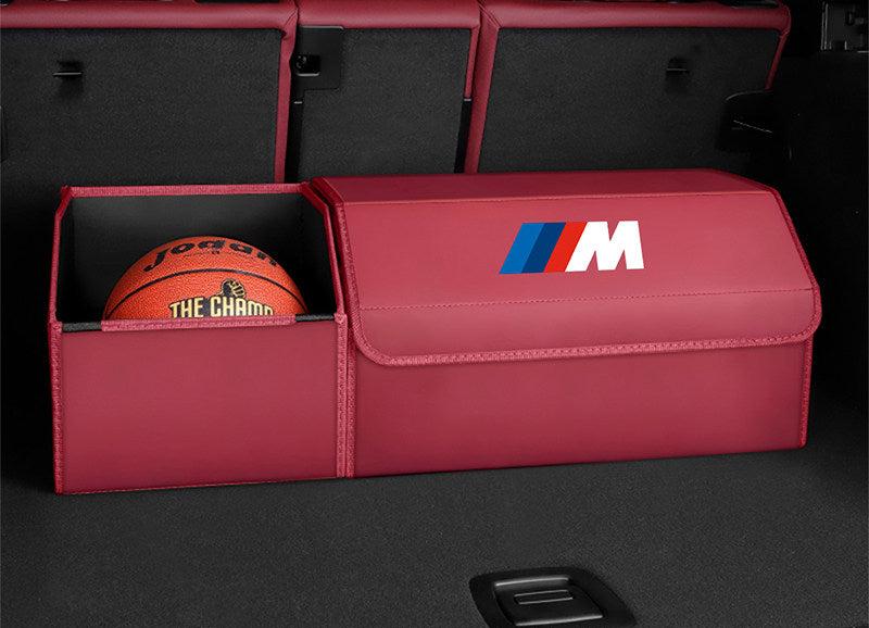 Burgundy leather BMW M trunk storage box - medium size with extended open basket holding a basketball